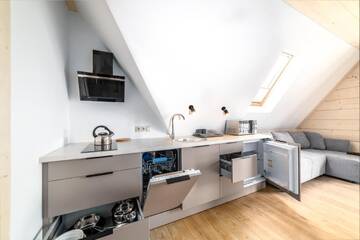 Фото номера Двухуровневые апартаменты Апартаменты Apartamenty Augustynówka г. Бжеги 2